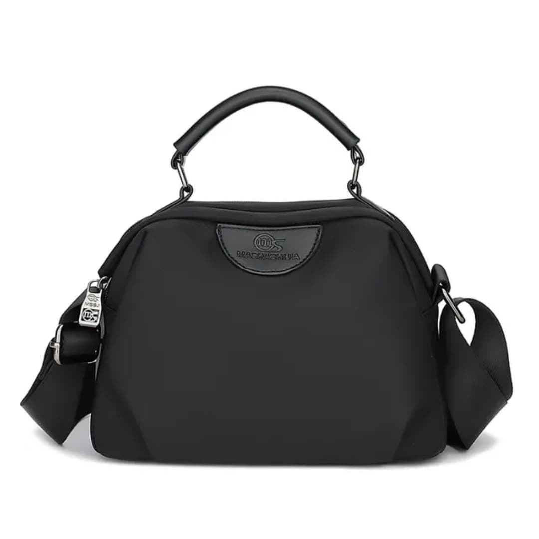 Portable nylon cloth shoulder bag with cowhide style detail