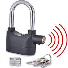 - Heavy-duty metal alarm padlock locked on a shop shutter in Bangladesh